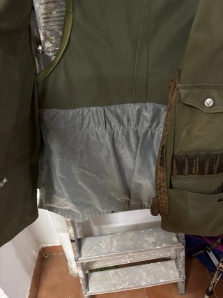 Chaleco de caza verde con bolsillos
