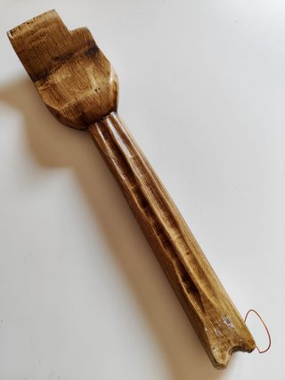 Rascador de espalda de madera tallada