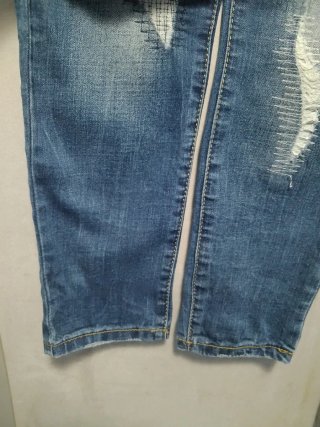 Jeans bambino strappati