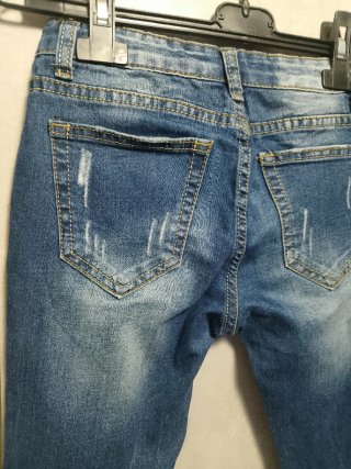 Jeans bambino strappati