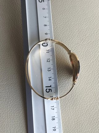 Pulsera oro con diseño de rosa nueva.
