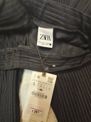 Pantalón oversize plisado negro