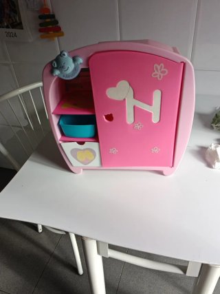 Cochecito de muñecas rosa y blanco