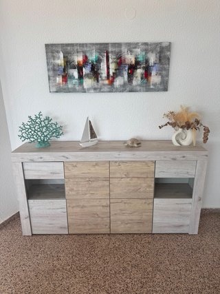 Conjunto de muebles salón-comedor.
