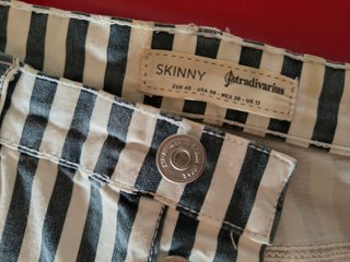 Pantalón rayas chica Stradivarius T.40
