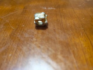 Charm para pulsera dorado