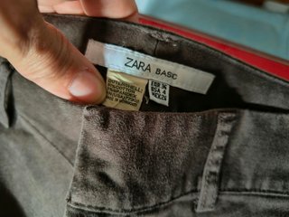 Pantalón pitillo acampanado marrón