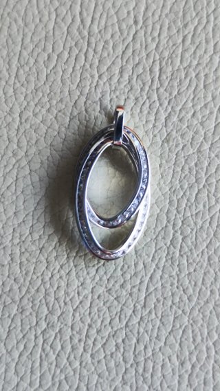 Colgante oro blanco con circonitas de chica nuevo