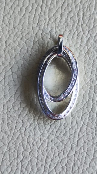 Colgante oro blanco con circonitas de chica nuevo