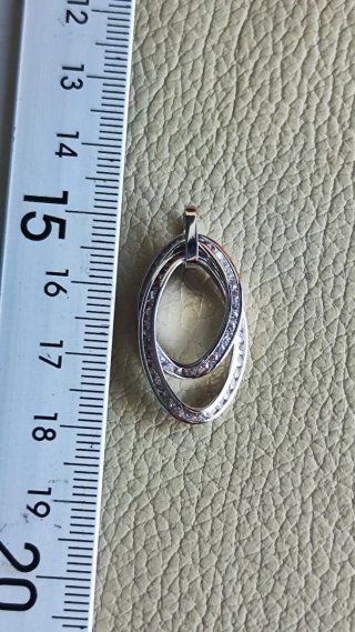 Colgante oro blanco con circonitas de chica nuevo