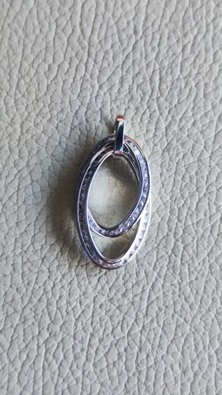 Colgante oro blanco con circonitas de chica nuevo