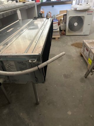 Compresor y máquina de aire acondicionado