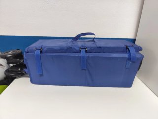 Cuna de viaje azul