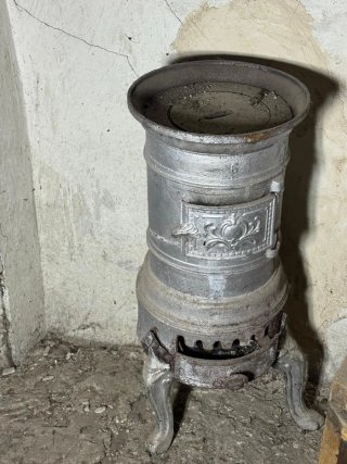 Estufa antigua hierro fundido decorativa