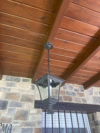 Farol de porche de metal y cristal
