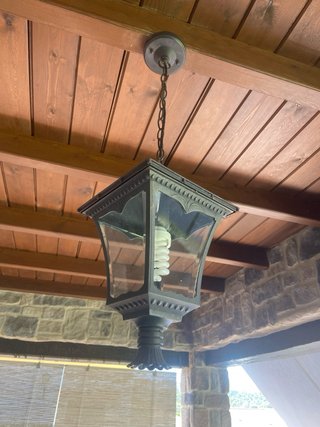 Farol de porche de metal y cristal