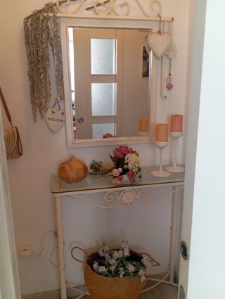 Mueble de forja y cristal para entrada