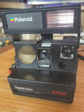 Cámara Polaroid Supercolor 670 AF instantánea