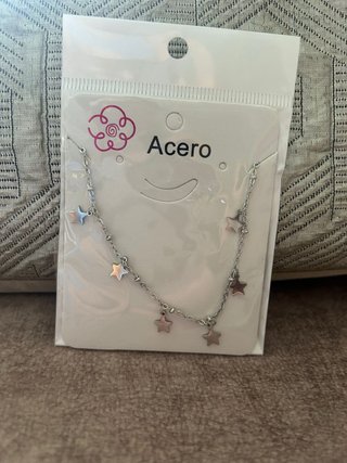 Collar de plata con estrellas