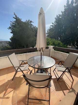 Mesa de terraza con 4 sillas