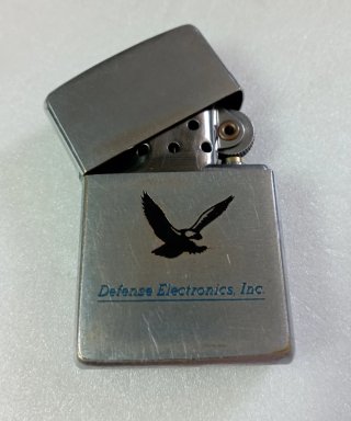 Zippo Antiguo Defense Electronics Inc.