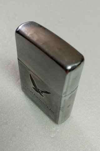 Zippo Antiguo Defense Electronics Inc.