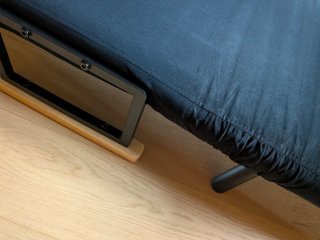 Sillón cama negro con cojín