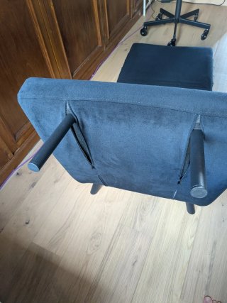 Sillón cama negro con cojín