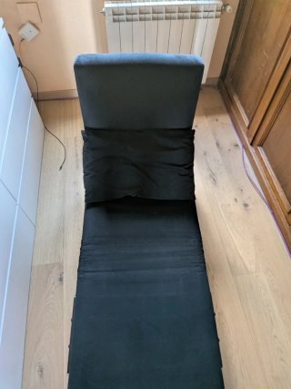 Sillón cama negro con cojín