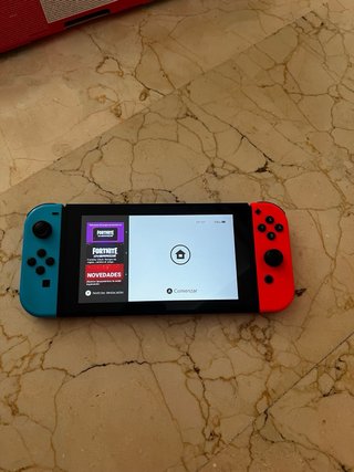 Nintendo Switch Azul/Rojo con caja y accesorios