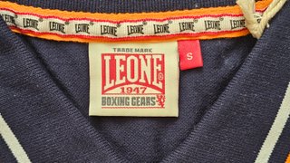 Polo Leone Blu con dettagli arancioni