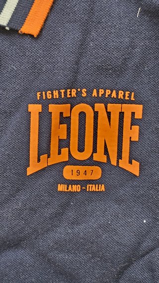 Polo Leone Blu con dettagli arancioni