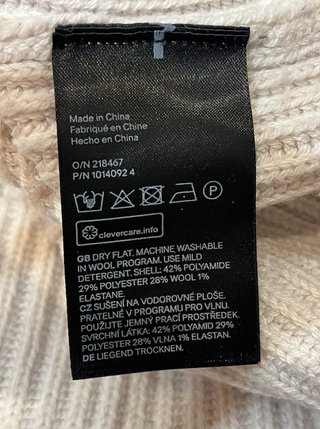 Vestido de invierno de punto beige H&M