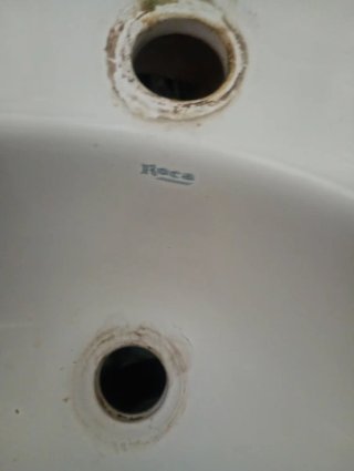 Lavabo de porcelana blanco con mueble