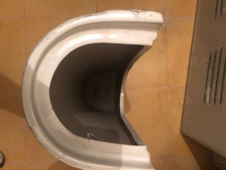Lavabo de porcelana blanco con pie