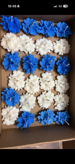 Vela em forma de rosa vermelha