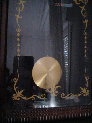 Reloj de pared antiguo péndulo