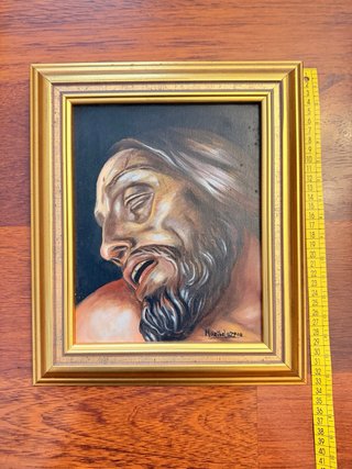 Cuadro con el rostro emotivo de Cristo