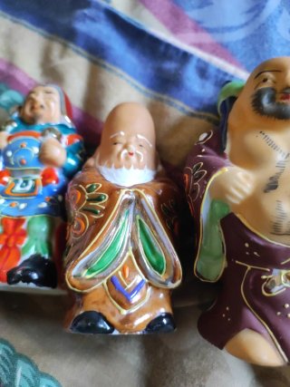Figuras de la suerte de porcelana
