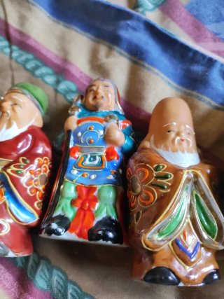 Figuras de la suerte de porcelana