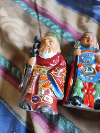 Figuras de la suerte de porcelana
