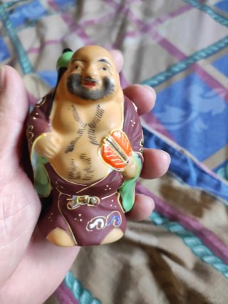 Figuras de la suerte de porcelana
