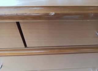 Mueble cómoda de madera con 7 cajones