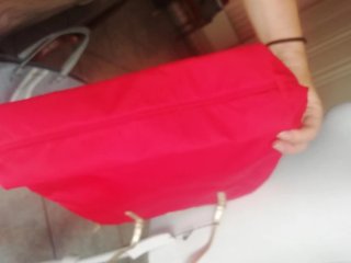 Borsa Coccinelle rossa con dettagli oro