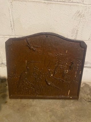 Placca decorativa in ghisa con uccelli