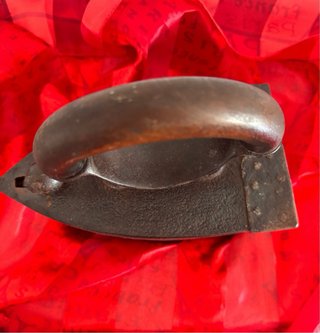 Plancha antigua de carbón
