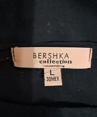 Blusa negra escote barco
