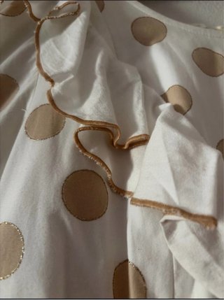Traje de flamenca beige y dorado