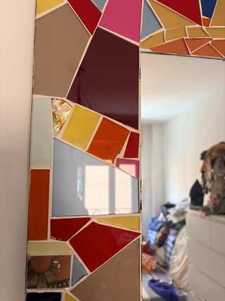 Marco de espejo o cabecero multicolor hecho a mano