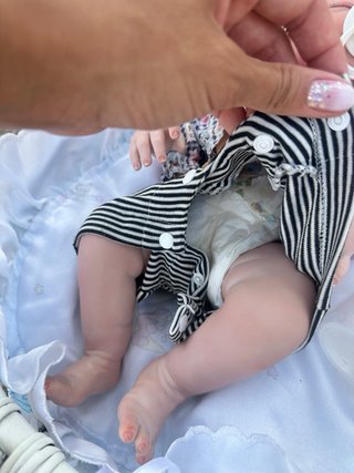 Bebé Reborn con Cuna, Biberón y Mantita